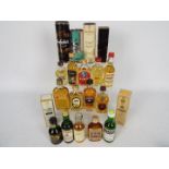 A collection of twenty whisky miniatures, predominantly single malts to include Knockando, Cardhu,