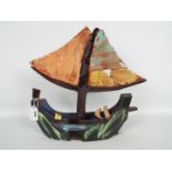 YASAHURU TAJIMA-SIMPSON (Taja) - A red earthenware model depicting a sail boat,