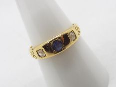 An 18ct yellow gold ring set with sapphire and diamond, size P, approximately 3.2 grams all in.