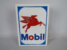 A Pegasus illuminated light box measuring approximately 43 cm x 31 cm.