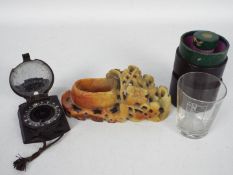 A German military marching compass and a Chinese soapstone brush washer.