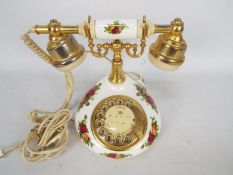 A Royal Albert Old Country Roses pattern telephone.