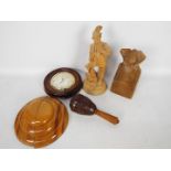 Treen - A turned wooden mallet, carving of a nun, wood cased barometer and similar.