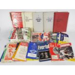 A collection of football related books including Topical Times and a quantity of match day