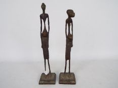 A pair of African bronze figures of slender, elongated form, possibly Benin,