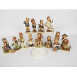 A quantity of Hummel figurines and a Collectors Club plaque, largest figure approximately 14 cm (h).