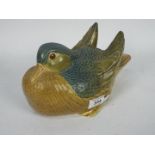 A Lladro figurine in the form of a Mandarin Duck, approximately 24 cm (l).