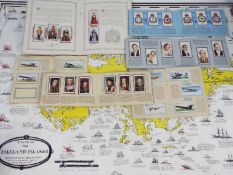A map of the Falkland Islands and a quantity of cigarette card albums