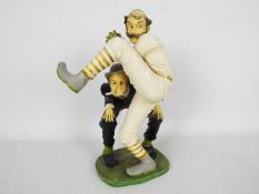 Figurine depicting a baseball pitcher, approximately 36 cm (h).