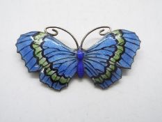 A John Atkins & Sons white metal and enamel brooch in the form of a butterfly,