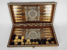 A Middle Eastern inlaid backgammon / chess set (no chess pieces included), 8.