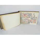 Philately - An album containing a quantity of world stamps.