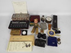 A mixed lot to include a vintage glass and white metal hipflask, opera glasses, trinket box,
