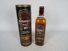 Bushmills - A 700ml bottle of 10 y/o single malt whiskey, 40% ABV, contained in tube.