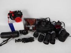 Photography - Cameras and accessories to include an Olympus XZ-1, Nikon F50,