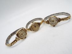 Three 9ct gold cased lady's wrist watches.