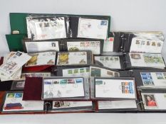 Philately - Ten binders of first day covers and a quantity of loose covers