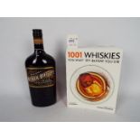 A 70cl bottle of Black Bottle blended whisky, 40% ABV and 1001 Whiskies You Must Try Before You Die.