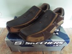 Skechers - a pair of brown Genesis-Shak