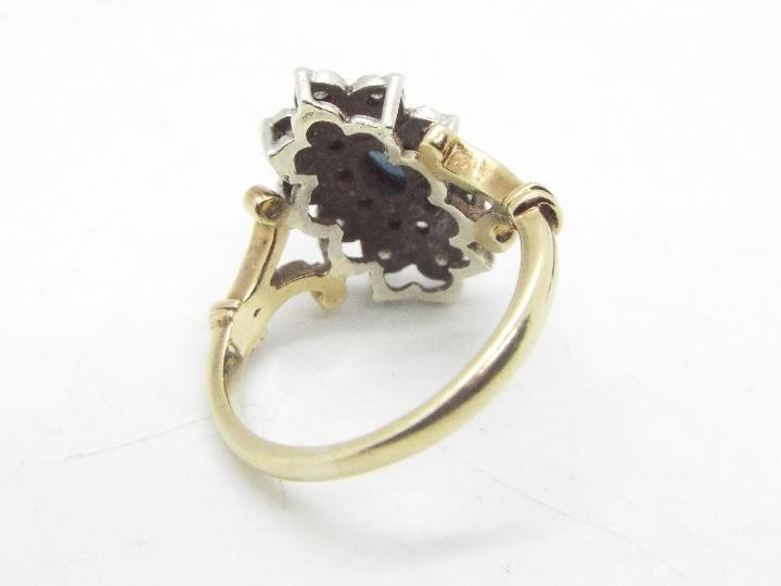 A 9ct yellow gold, stone set, dress ring, size L, approximately 4.1 grams all in. - Image 3 of 4