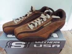 Skechers - a pair of brown urban track t