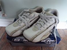Skechers - a pair of off-white (beige) c