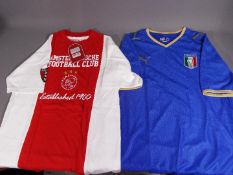 Football Shirts - two replica football shirts,