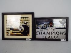 Two signed photographs, framed under glass, Frank Rijkaard and Paul Robinson,