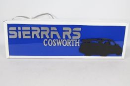 A Sierra RS Cosworth illuminated lightbo