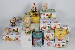 A collection of boxed Piggin figures designed by David Corbridge, approximately 20 in total.