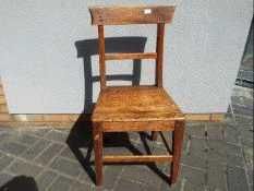 A Victorian oak hall chair