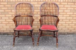 A pair of Windsor stick back armchairs.
