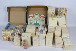 A large quantity of boxed Cherished Teddies figurines including Club Membearship year figures.
