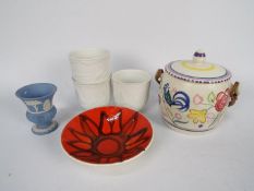 A small lot of mixed ceramics to include Lladro, Poole Pottery and Wedgwood.