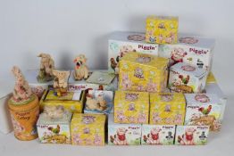 A collection of boxed Piggin figures designed by David Corbridge, approximately 20 in total.