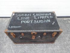 A vintage, metal bound, shipping trunk, marked to the top Sudan Shipping Line Limited Port Sudan S.