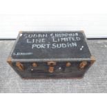 A vintage, metal bound, shipping trunk, marked to the top Sudan Shipping Line Limited Port Sudan S.