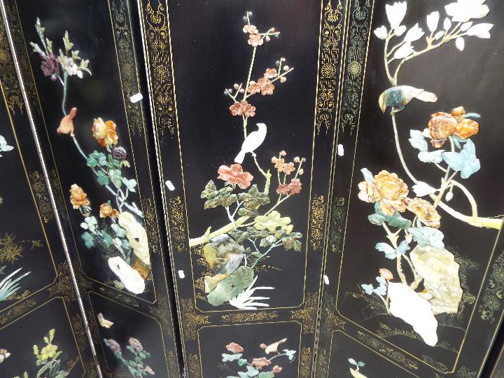 A large black lacquer, six leaf screen measuring approximately 183 cm x 240 cm. - Image 3 of 5