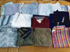 A job lot of 12 gentlemen's shirts, various adult sizes,