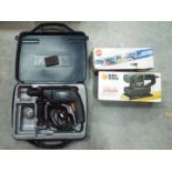 A Black & Decker drill i carry case, boxed Black & Decker sander and a boxed footpump.