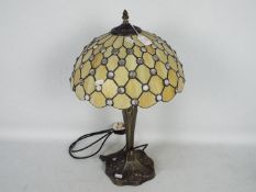 A Tiffany style table lamp, approximately 55 cm (h).