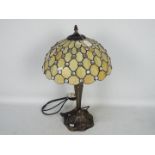 A Tiffany style table lamp, approximately 55 cm (h).