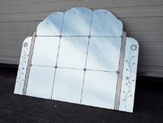 An Art Deco style peach and clear glass wall mirror, approximately 90 cm x 121 cm.