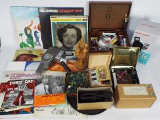 A mixed lot to include vinyl records, sewing box and contents, Sabre EE Zoom cine camera,