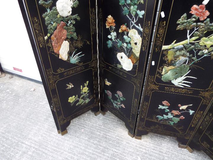 A large black lacquer, six leaf screen measuring approximately 183 cm x 240 cm. - Image 2 of 5