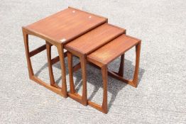 G-Plan - A nest of three Quadrille occasional tables, largest approximately 49 cm x 53 cm x 43 cm.