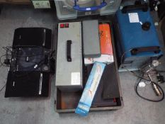 Mixed tools to include a portable airbrush spray booth, rotary tool kit, belt clamp, and similar.