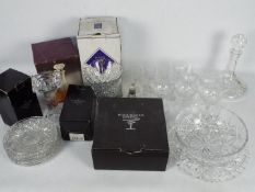 A collection of glassware, part boxed to include vase, decanters, glasses and similar.