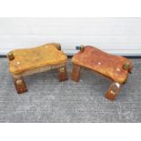 Two leather topped camel stools.