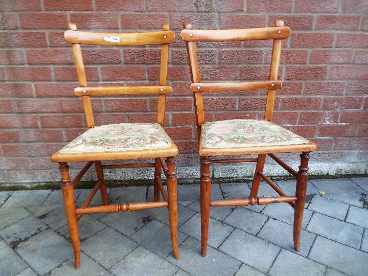 A matched pair of Edwardian chairs, the